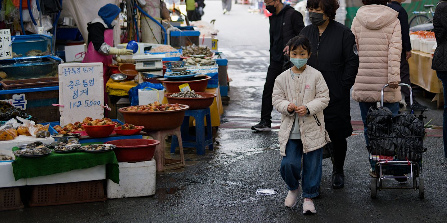 Girl at busy market